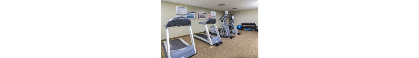 Break a sweat at our 24-hour fitness center with treadmills, ellipticals, and exercise bikes.